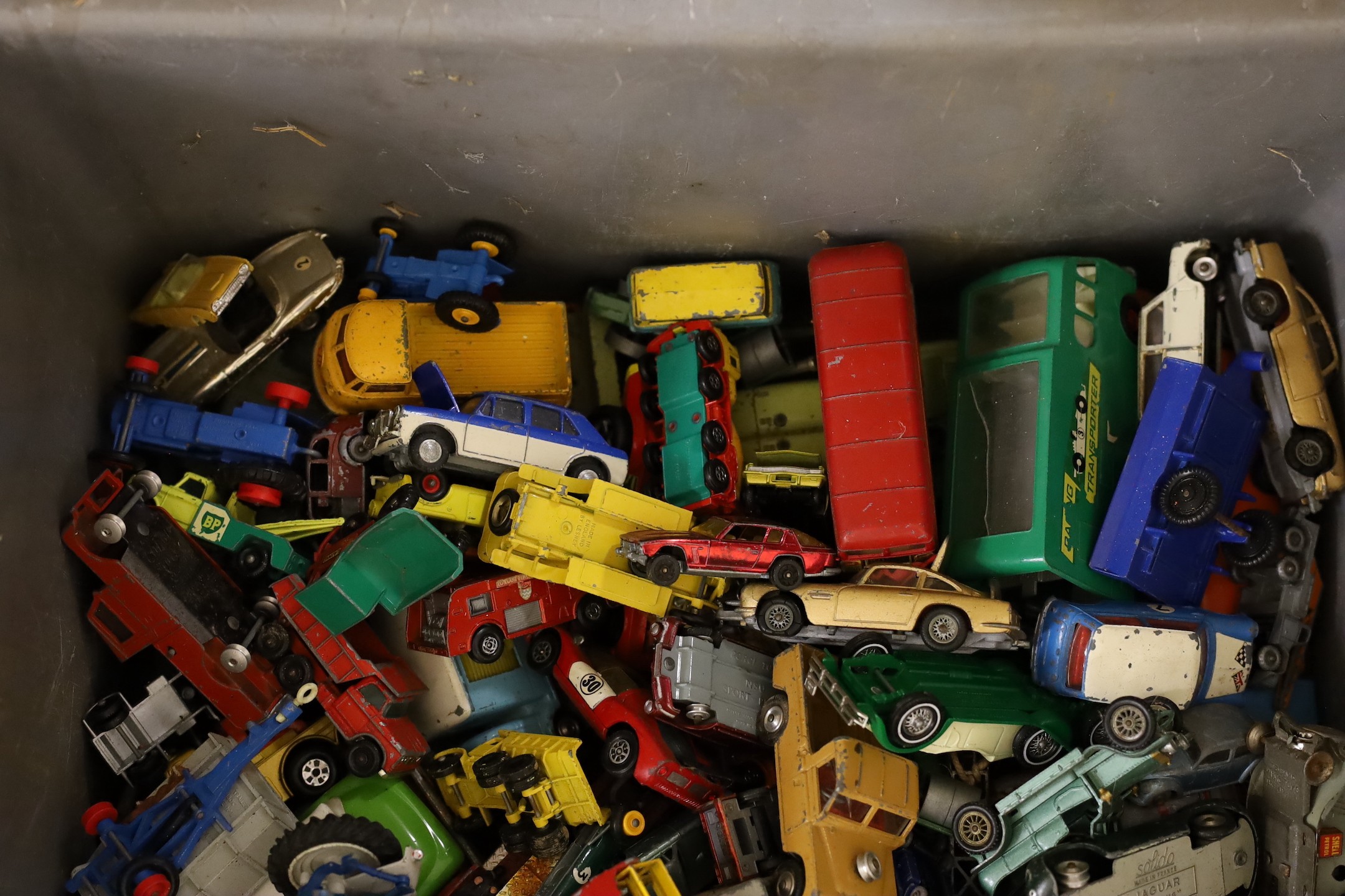 A large collection of used mixed die-cast toys